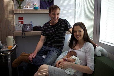Proud parents: John and Mel Hogan with baby Georgia. [Photo courtesy: Kent Kingston]