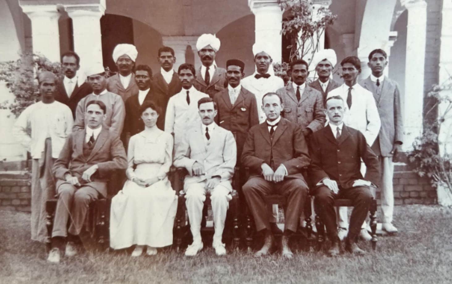 Indian Christian Training School (1915-1916). Seated (from left) H. Williams, treasurer of the India Union; Mrs. Blue and I. Frank Blue, principal of ICTS; J. S. James, acting India Union president; and S. A. Wellman, chairman of India Financial Association, the legal body of the India Union. Standing are the first students of the Indian Christian Training School. [Courtesy of Southern Asia Division Heritage Centre.]
