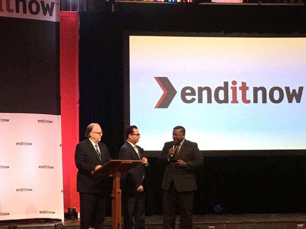 Daniel R. Jackson (NAD president), along with Jose Cortes Jr. and Ivan Williams (from the NAD Ministerial Association), welcome Spanish-speaking attendees at the enditnow Pastors' Summit on Abuse on Sept. 12, 2017. [Photo: Pieter Damsteegt, North American Division News]
