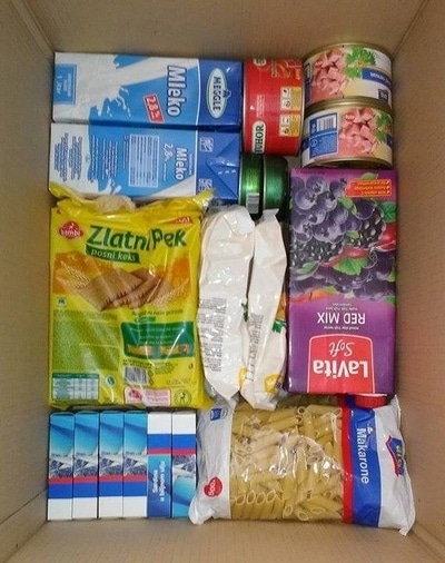 The contents of an ADRA care package distributed in Serbia include macaroni, milk and fruit juice. Photo credit: ADRA-Serbia