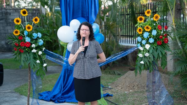Karen Glassford, AWR Center for Digital Evangelism director, leads in a prayer of dedication of the new center at the Southern Asia Pacific Division headquarters in Silang, Cavite, Philippines. [Photo: Southern Asia Pacific Division News]