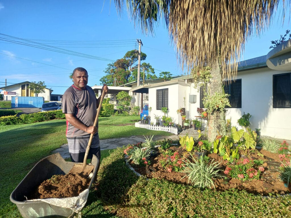 Fiji Mission President working in His flower garden 1024x768 1