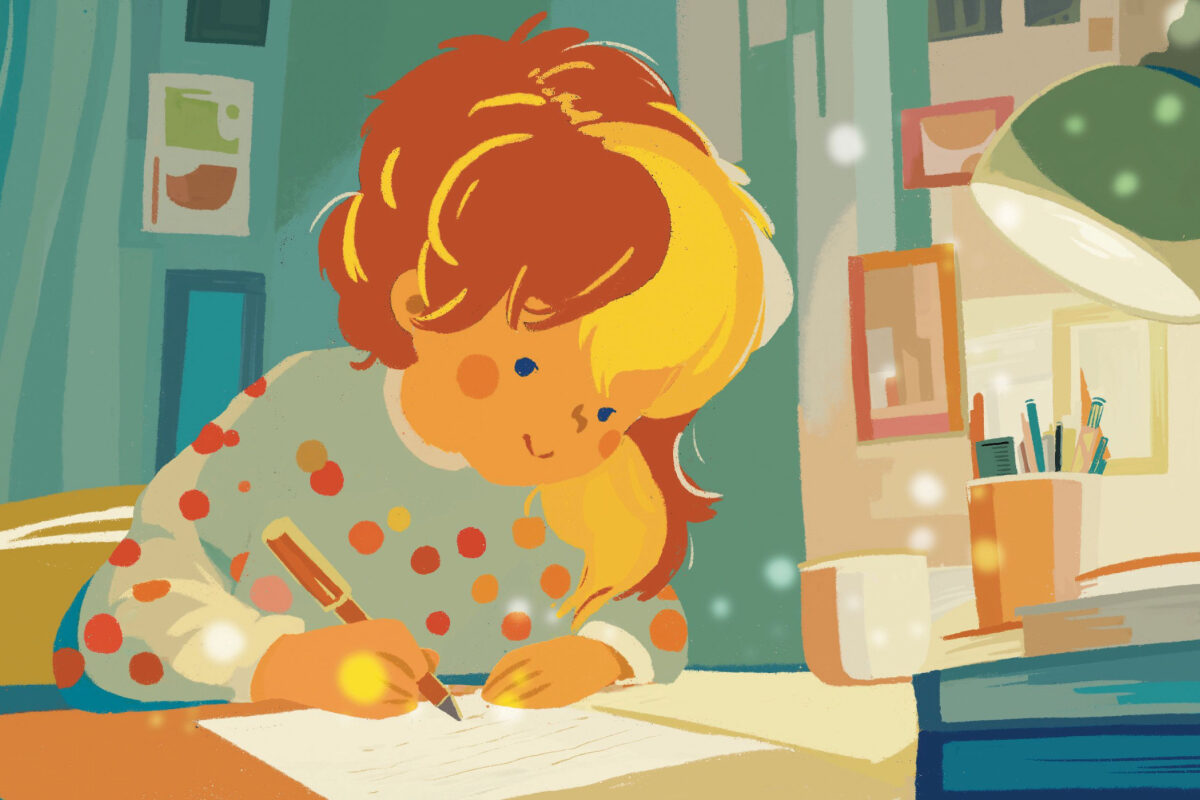 A young child sits at a cozy desk, happily focused on writing under the warm glow of a lamp.